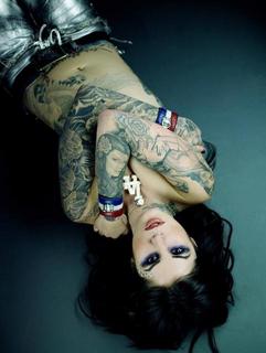 Tattoo artist, famous for her show \"LA Ink\"